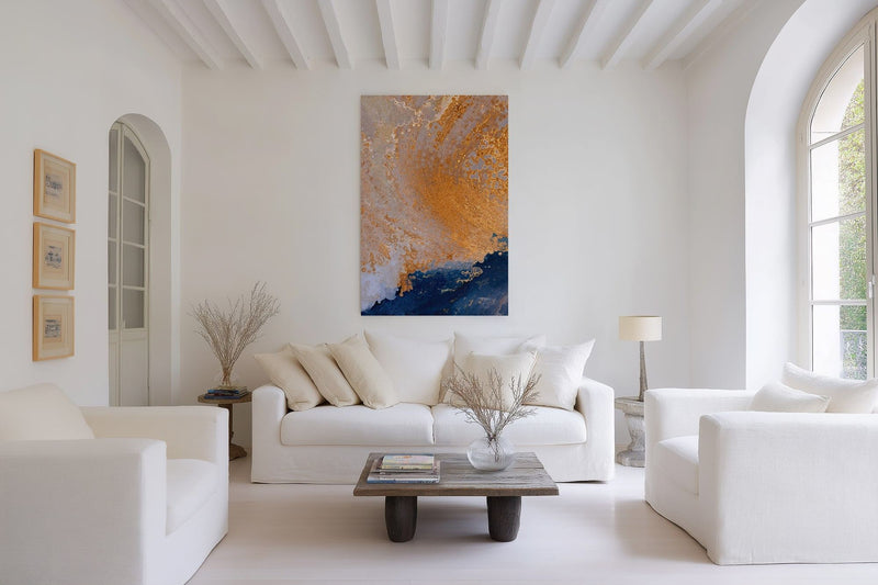 Joy in Believing, 1 Peter 1:8 canvas print above a white sofa in a wide, bright living room