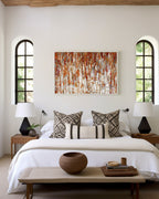 Under His Care, Isaiah 54:17 canvas print above the bed between two arched windows