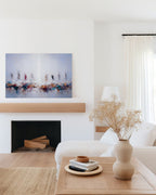 In Remembrance of Me, Luke 22:19 canvas print above a wooden mantel shelf in a white living room