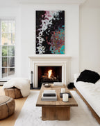 Jesus Christ, The Alpha and Omega, Revelation 1:8 canvas print above a lit fireplace with a white mantel