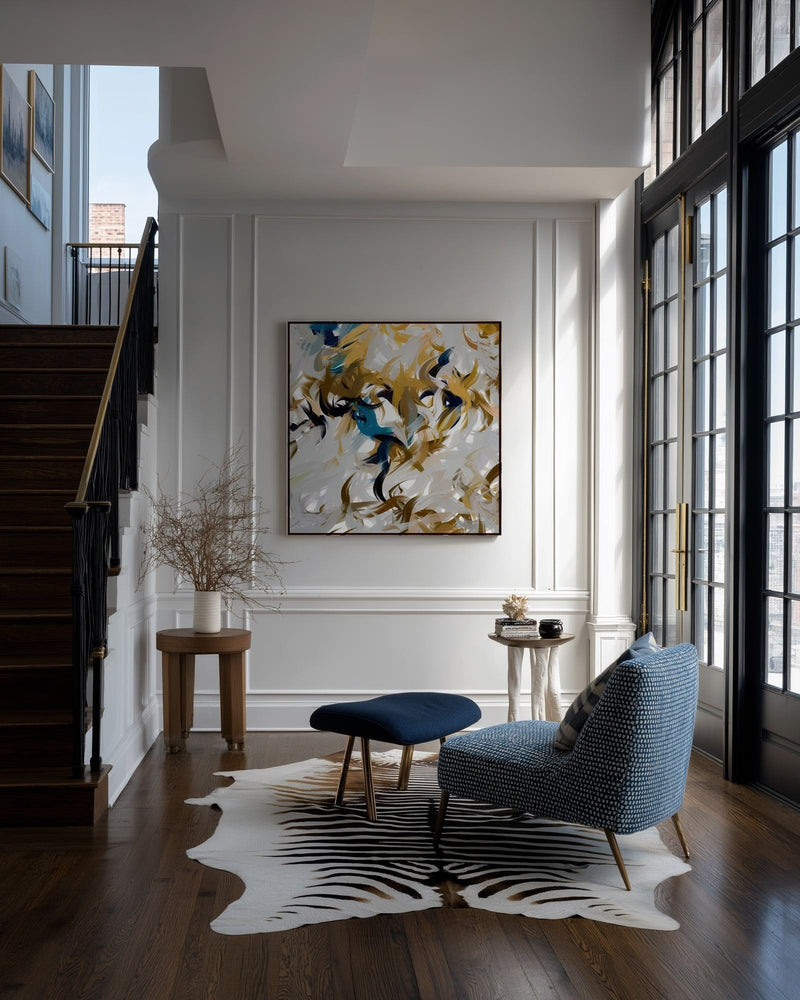 Breath of the Almighty, Job 33:4 canvas print on a panelled wall beside a staircase and a blue armchair