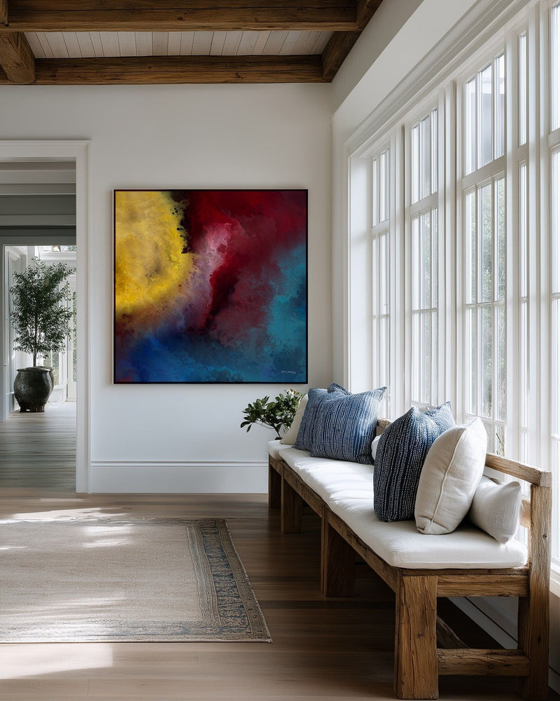 Let There Be Light, Genesis 1:3 canvas print above a cushioned bench beside a wall of windows