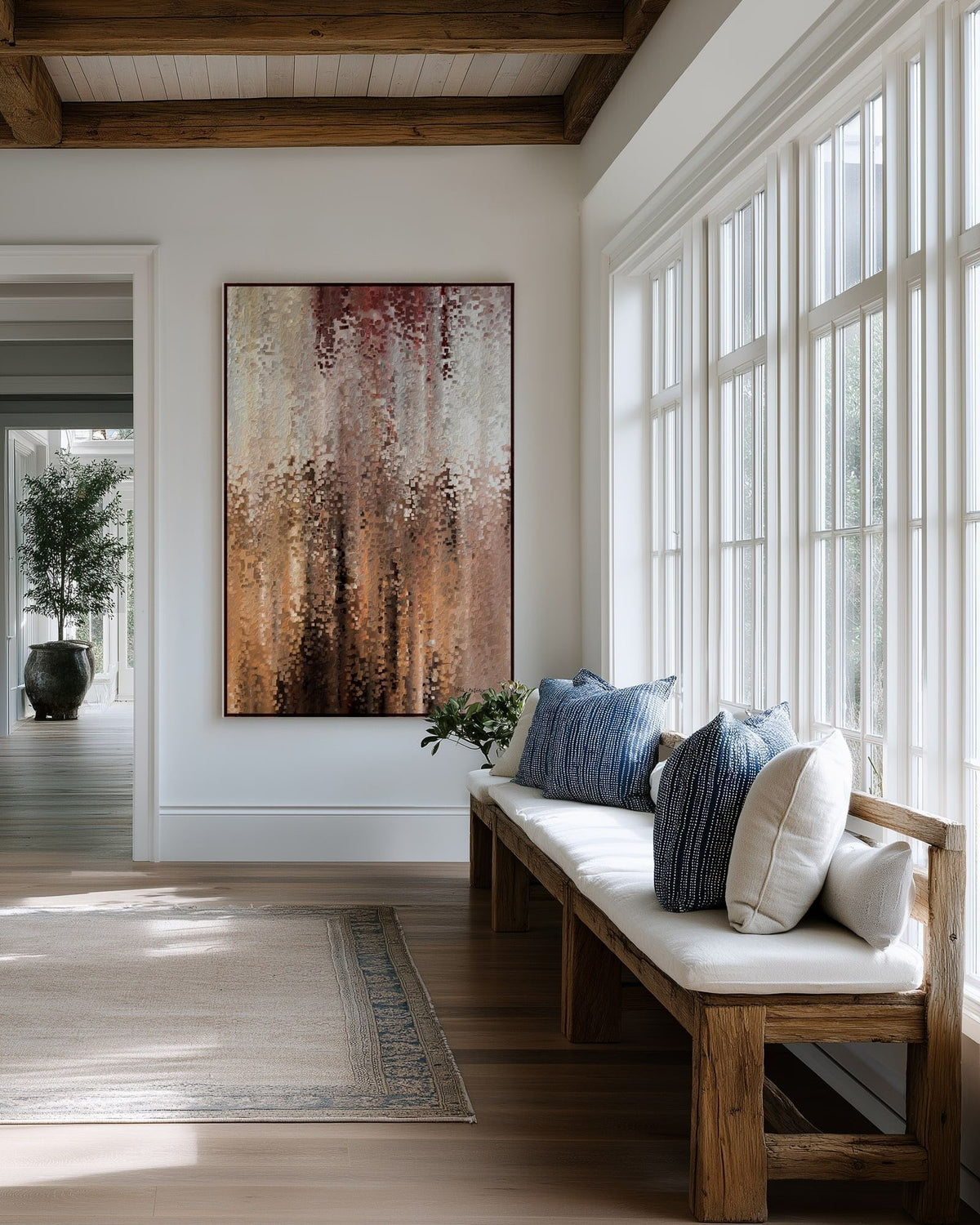 I Am With You, Isaiah 41:10 canvas print above a cushioned bench beside a wall of windows