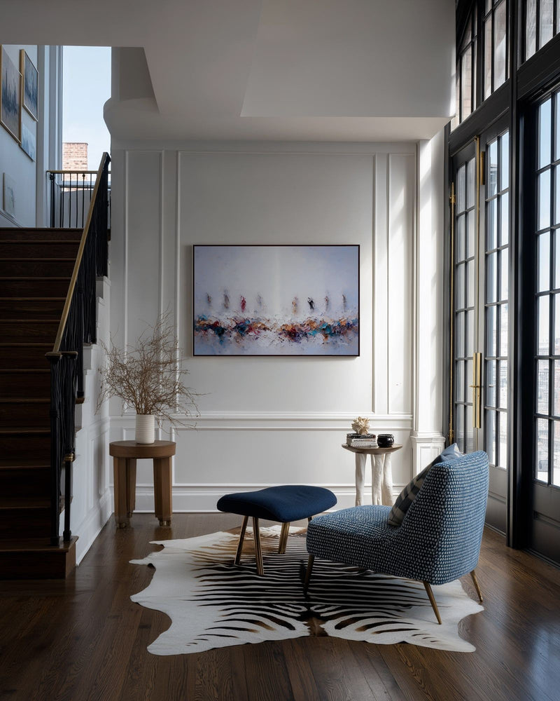 In Remembrance of Me, Luke 22:19 canvas print on a panelled wall beside a staircase and a blue armchair